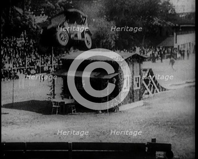 A Motorcar Jumping Over a Wooden Shack, 1920. Creator: British Pathe Ltd.