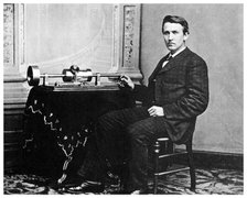Thomas Alva Edison, American inventor, with his phonograph, c1878 (1955). Artist: Unknown