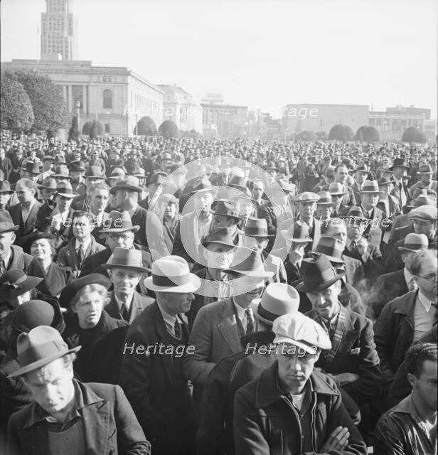 Listening to speeches at mass meeting of WPA workers protesting..., San Francisco, California, 1939. Creator: Dorothea Lange.