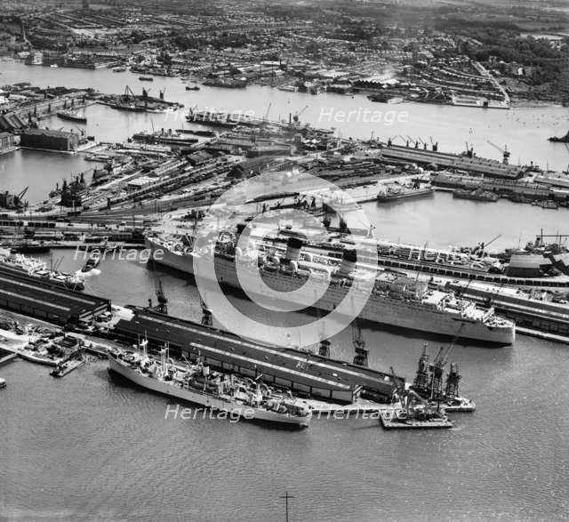 RMS 'Queen Mary' in Ocean Dock, Southampton, Hampshire, 1946. Artist: Aerofilms.