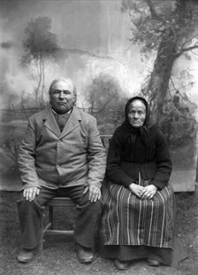 Homeowner and church steward Näs Jonas Jonsson (1825-1908) with his wife..., 1900-1908. Creator: Per Persson.