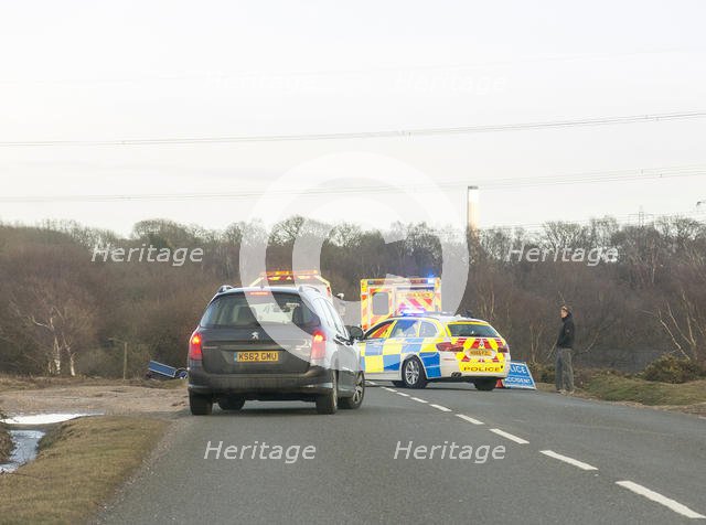 Police car and ambulance attending road traffic accident 2018. Creator: Unknown.