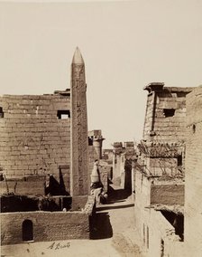 Entrance to Temple of Luxor with Modern Mud-Brick Houses. Luxor, East Bank, between 1860 and 1903. Creator: Antonio Beato.