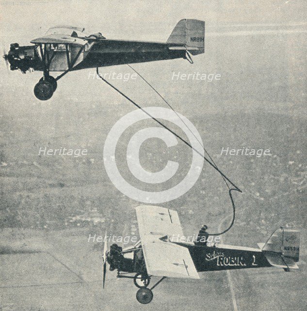 The 'St Louis Robin' refuelling, c1929 (c1937). Artist: Unknown.