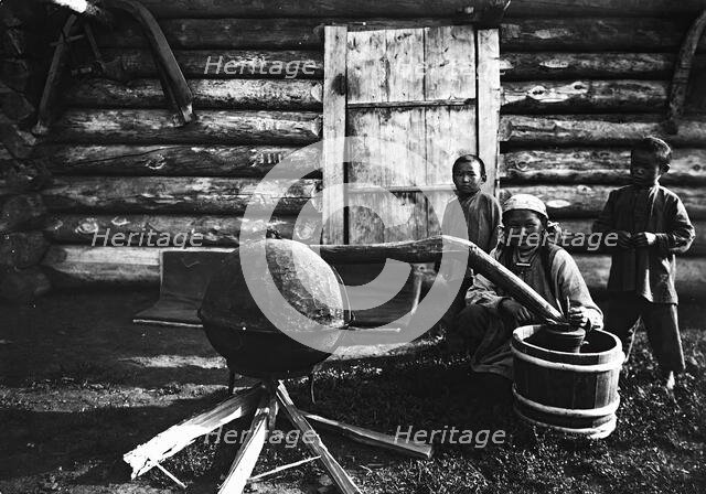 Woman preparing tarasun, 1890. Creator: Unknown.