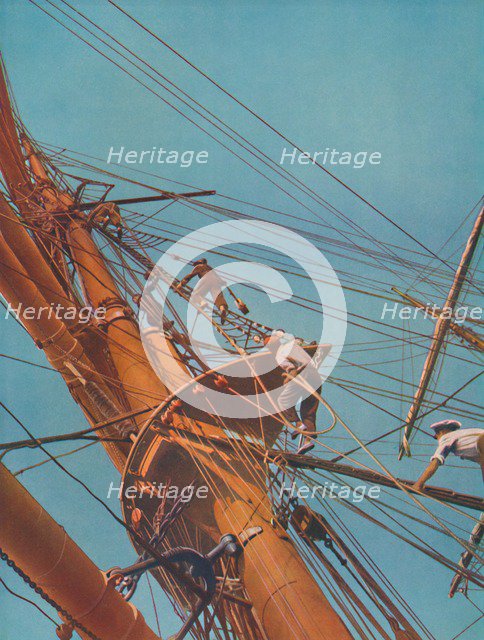 'Going aloft on board the Archibald Russell,  square-riggers under Finnish flag', 1937. Artist: Unknown.