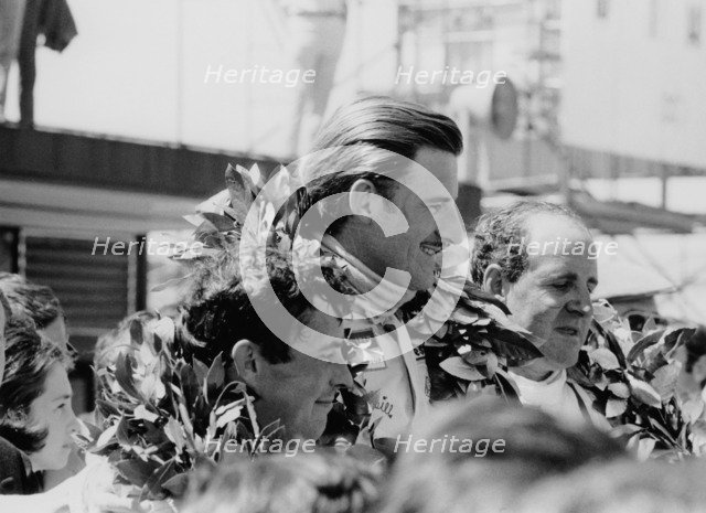 Graham Hill, Denny Hulme and Brian Redman, Spanish Grand Prix, 1968. Artist: Unknown