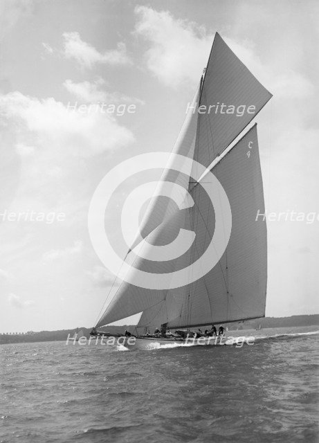 The 19-metre cutter 'Norada' sailing close reaching, 1911. Creator: Kirk & Sons of Cowes.