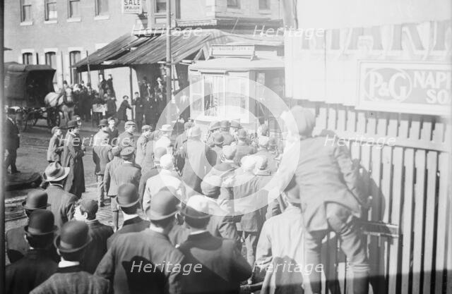 Strikers clamoring for motorman of car, Philadelphia, 1910. Creator: Bain News Service.