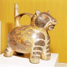 Painted pottery Bridge and Spout vessel in the form of a Jaguar, Tiahuanaco, Peru, 100-600. Artist: Unknown.