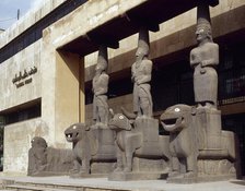 Basalt caryatids at the entrance to the National Museum of Aleppo, Syria, 2001. Creator: LTL.