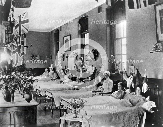 Hahnemann Hospital and Homeopathic Dispensaries, Liverpool: a women's ward, decorated..., [1910?]. Creator: Unknown.