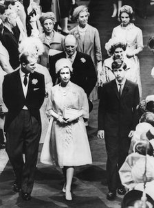 The Queen, Prince Philip, and Prince Charles attending the wedding of Princess Alexandra, 1963. Creator: Unknown.