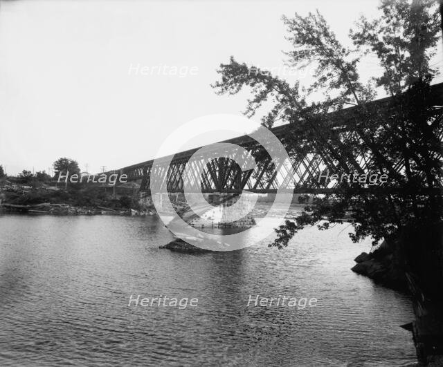 Black River Falls, Wis., railroad crossing, between 1880 and 1899. Creator: Unknown.