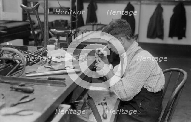 Crippled jewelry worker, between c1915 and c1920. Creator: Bain News Service.
