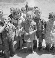Children who attend nursery school, Farmersville FSA camp, Tulare County, California, 1939. Creator: Dorothea Lange.