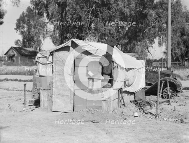 House in camp of carrot pullers, near Holtville, Imperial Valley, California, 1939. Creator: Dorothea Lange.