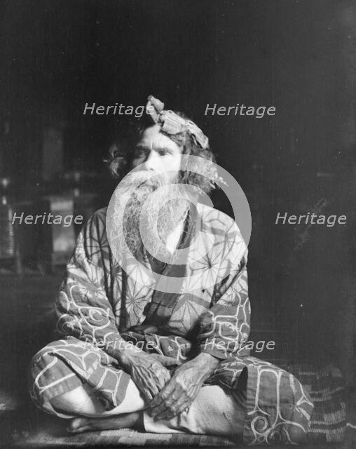 Ainu chief wearing a headdress, 1908. Creator: Arnold Genthe.
