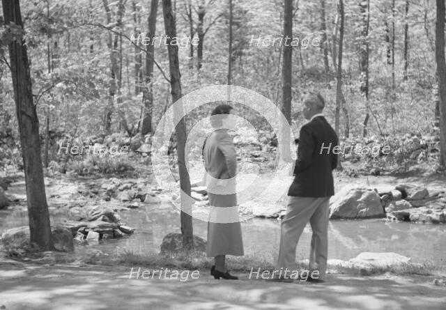 Rothbart, Albert, Mr., group, standing outdoors, between 1920 and 1935. Creator: Arnold Genthe.