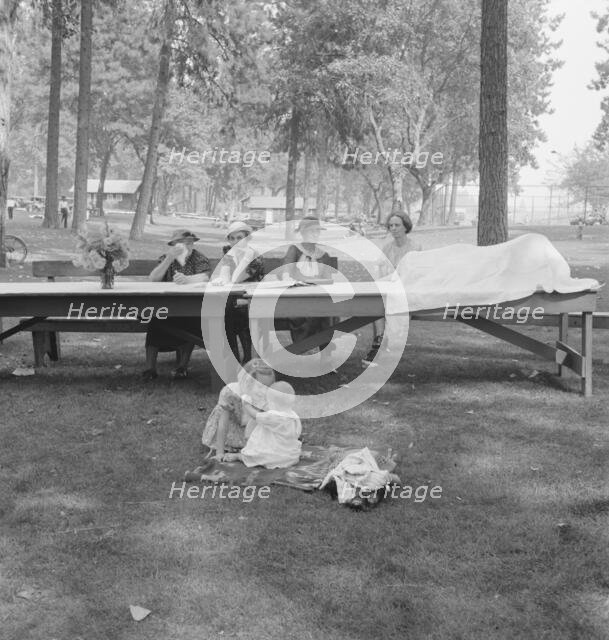 "California Day," a picnic in town park on the Rogue River, Grants Pass, Oregon, 1939. Creator: Dorothea Lange.