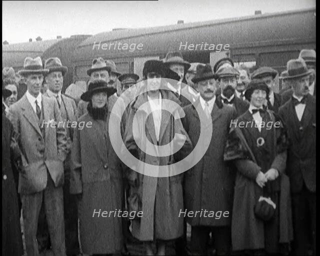 Sinn Fein Delegates Standing by a Train After Arriving in London, 1922. Creator: British Pathe Ltd.