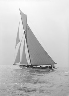 The cutter 'Westwind' sailing close-hauled, 1914. Creator: Kirk & Sons of Cowes.