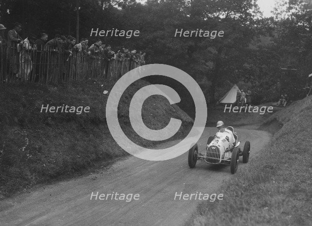 Austin competing in the Shelsley Walsh Amateur Hillclimb, Worcestershire, 1929. Artist: Bill Brunell.