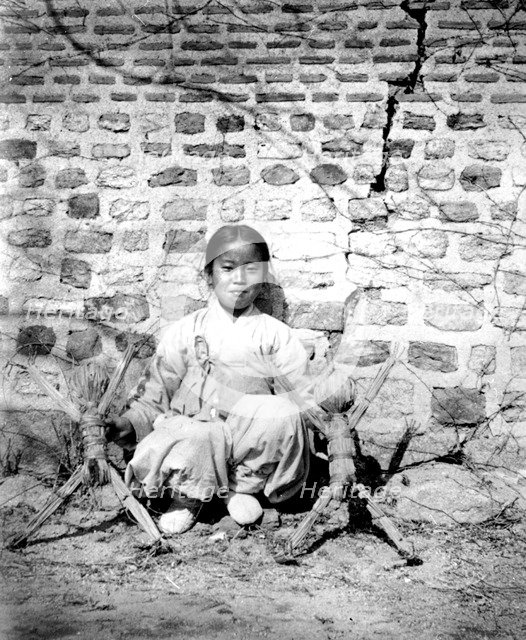 Korean girl with dolls, 1900. Artist: Unknown