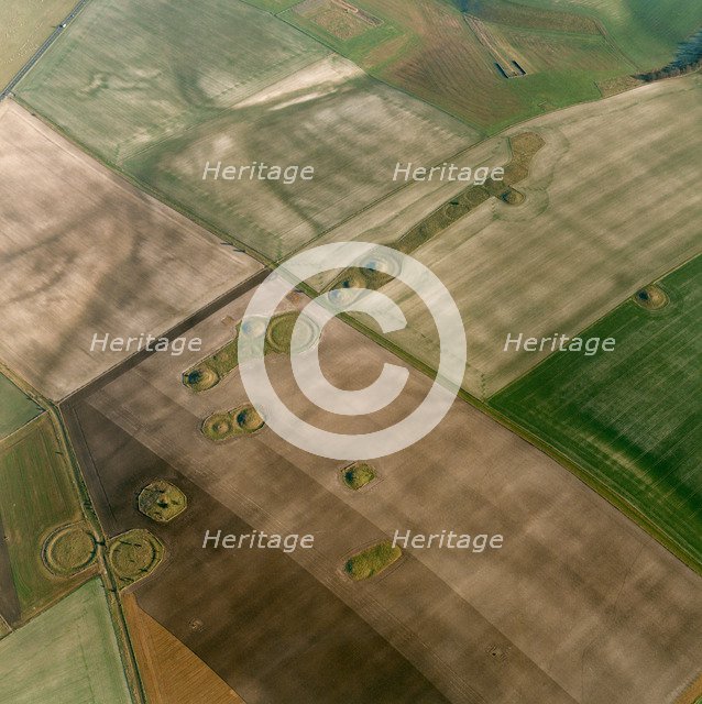 Aerial view showing the remains of barrows in the landscape around Normanton Down, Wiltshire, 2000. Artist: EH/RCHME staff photographer