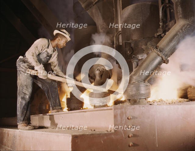 A large electric phosphate smelting furnace used to make...vicinity of Muscle Shoals, Ala., 1942. Creator: Alfred T Palmer.