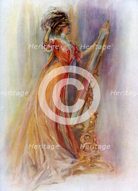 Woman admiring herself in a mirror, 1908-1909.Artist: Hubner & Wilson 