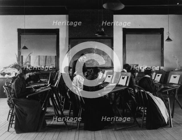 Group portrait of teacher and students at Hampton Institute painting watercolor..., 1899 or 1900. Creator: Frances Benjamin Johnston.