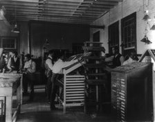 Students working in print shop, Tuskegee Institute, Alabama, 1902. Creator: Frances Benjamin Johnston.
