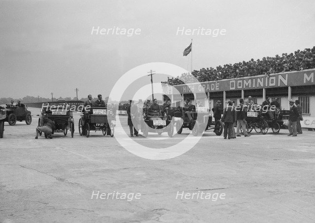 Cars competing in the BARC Daily Sketch Old Crocks Race, Brooklands, 1931. Artist: Bill Brunell.
