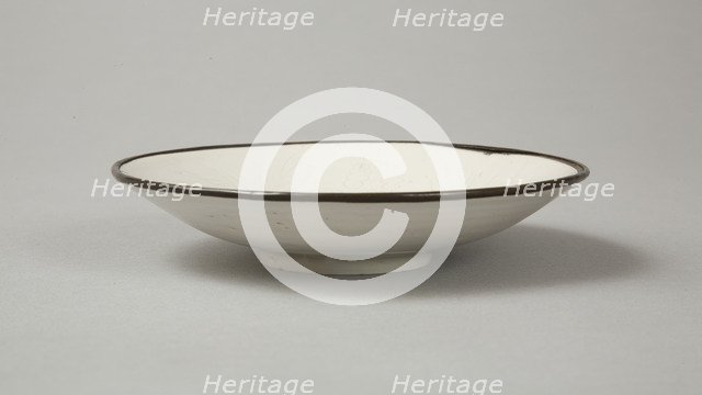 Small Ding-type bowl with incised peony scroll and dragon, 20th century. Artist: Unknown.