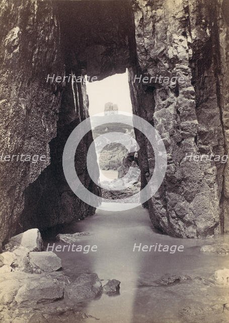 [View Through Rocks' Of Tower On Hill], 1870s. Creator: Francis Bedford.