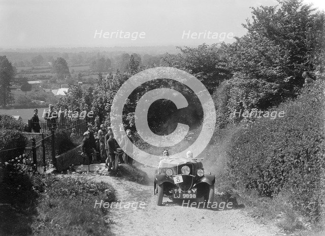 1934 Ford open 2-seater type taking part in a West Hants Light Car Club Trial, 1930s. Artist: Bill Brunell.