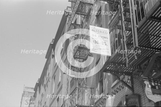 A sign offering apartments for rent, 61st Street between 1st and 3rd Avenues, New York, 1938. Creator: Walker Evans.