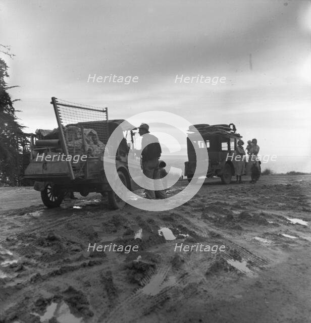 Two families of migrants from Missouri looking for work in the pea fields, California, 1936. Creator: Dorothea Lange.