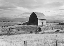 Type barn, characteristic of Idaho, on farm of older settler, Boundary County, Idaho, 1939. Creator: Dorothea Lange.