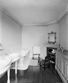 A bathroom at 41 Grosvenor Square, Westminster, London.  Artist: Bedford Lemere and Company