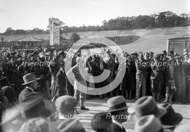 Earl Howe at the BARC Meeting, Brooklands, 25 May 1931. Artist: Bill Brunell.