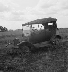 The end of the Model "T" abandoned...along Highway 99, North of Eugene, Oregon, 1939. Creator: Dorothea Lange.