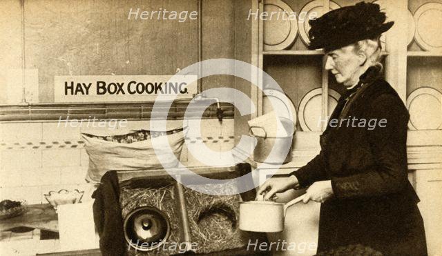 Hay box cooking, First World War, 1914-1918, (1933).  Creator: Unknown.