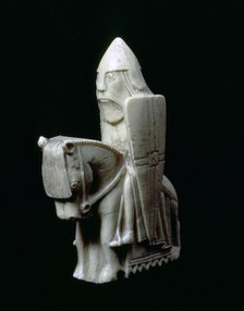 A Knight - The Lewis Chessmen, (Norwegian?), c1150-c1200. Artist: Unknown