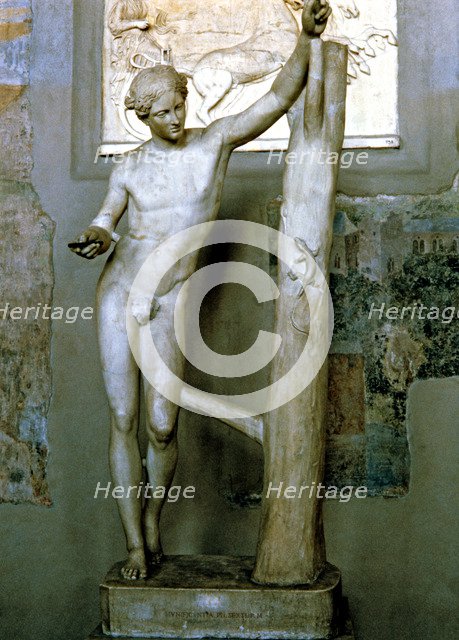Apollo Sauróctonos, work by Praxiteles preserved in the Vatican Museums .