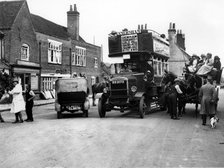 1920's Thornycroft J bus in busy street scene. Creator: Unknown.