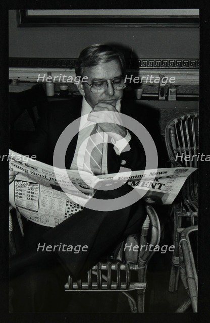 A quiet moment for trombonist Kai Winding at the Capital Radio Jazz Festival, London, 1979. Artist: Denis Williams