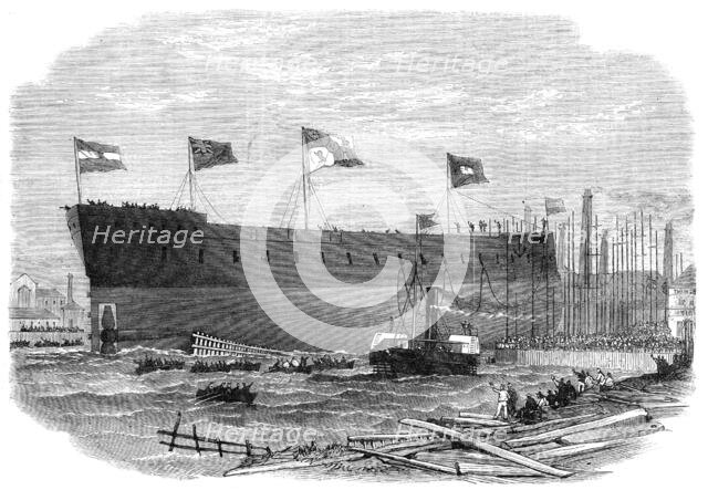 Launch of the Victoria, iron-clad frigate built for the Queen of Spain at Blackwall, 1865. Creator: Smyth.