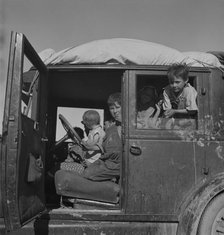 Migrant children from Oklahoma on California highway, 1937. Creator: Dorothea Lange.